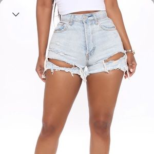 Light blue Hi rise distress shorts